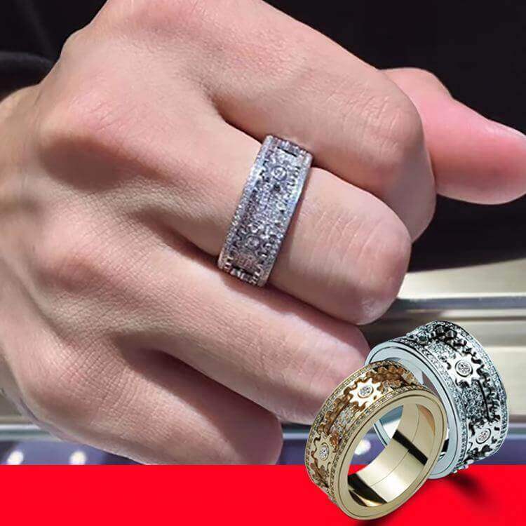 Stylish silver fidget ring for anxiety and focus worn on hand with two additional ring designs shown on a red background.
