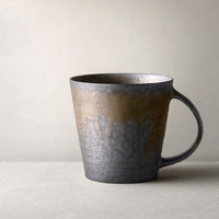 Vintage stoneware coffee cup
