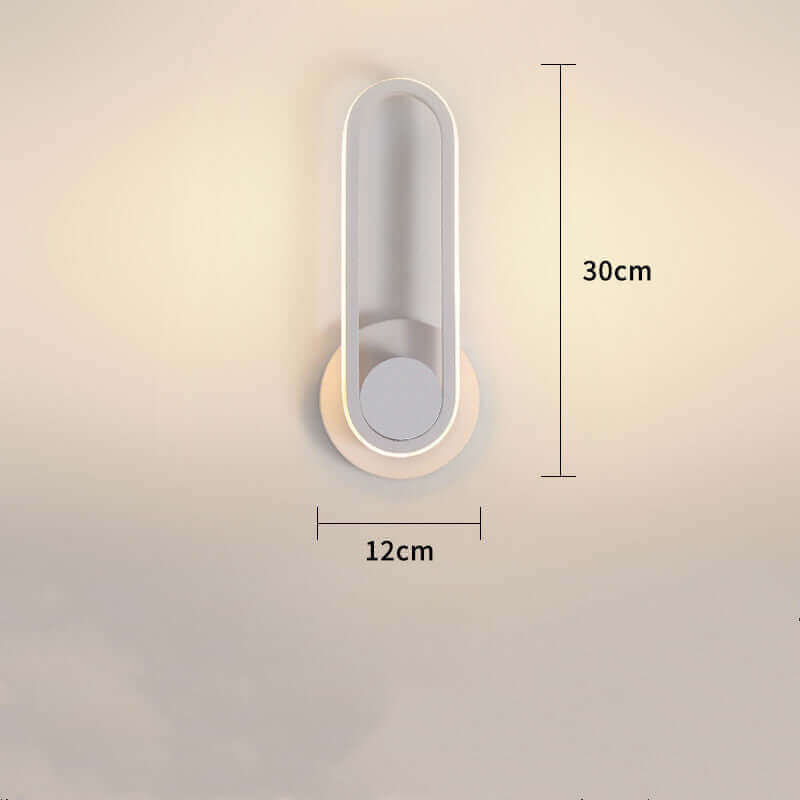 Modern oval wall lamp with sleek design, warm white light, and 330° rotation, shown with dimensions 30cm length and 12cm width