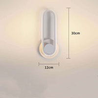 Modern oval wall lamp with sleek design, warm white light, and 330° rotation, shown with dimensions 30cm length and 12cm width