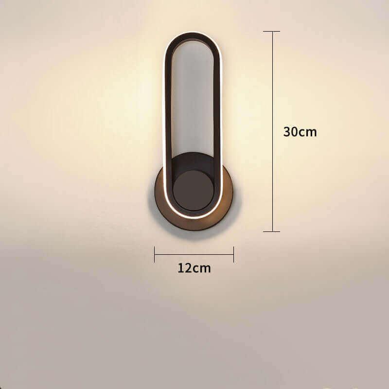 Modern oval bedroom bedside lamp with warm white light, 30cm length and 12cm width, sleek design made of high-quality aluminum.