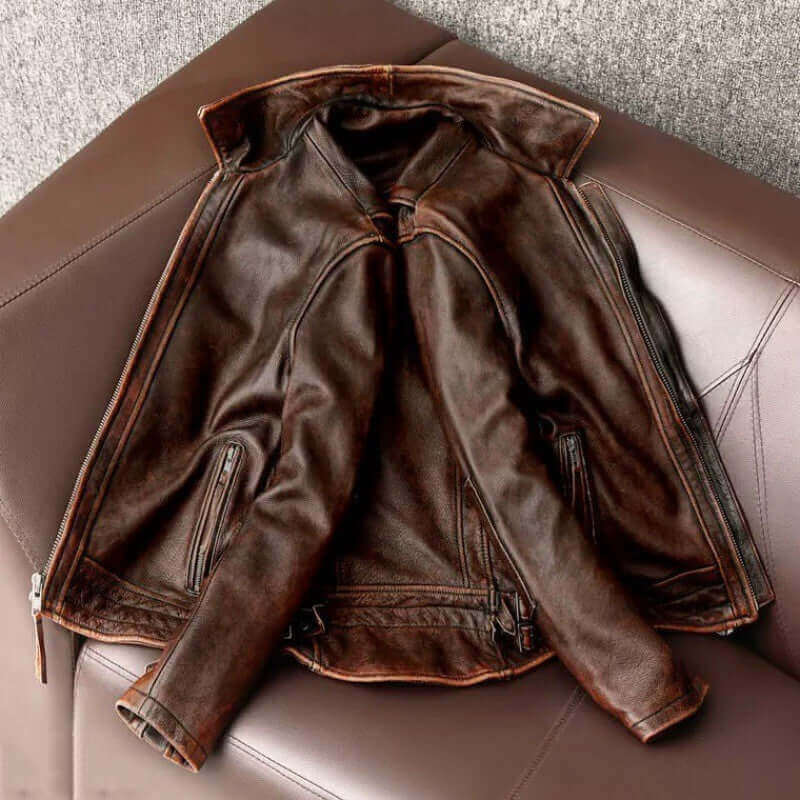 Men's Fashionable Vintage Distressed Cowhide Leather Jacket in Brown on Chair