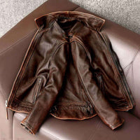 Men's Fashionable Vintage Distressed Cowhide Leather Jacket in Brown on Chair