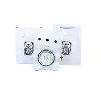 Everlasting Love: Eternal Rose Bear with Rotating Jewelry Box