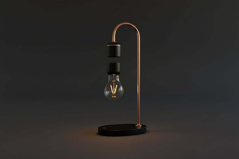 A levitating smart lamp with a transparent bulb, silver metal parts, and a vintage wood base, illuminated and floating above a black surface.